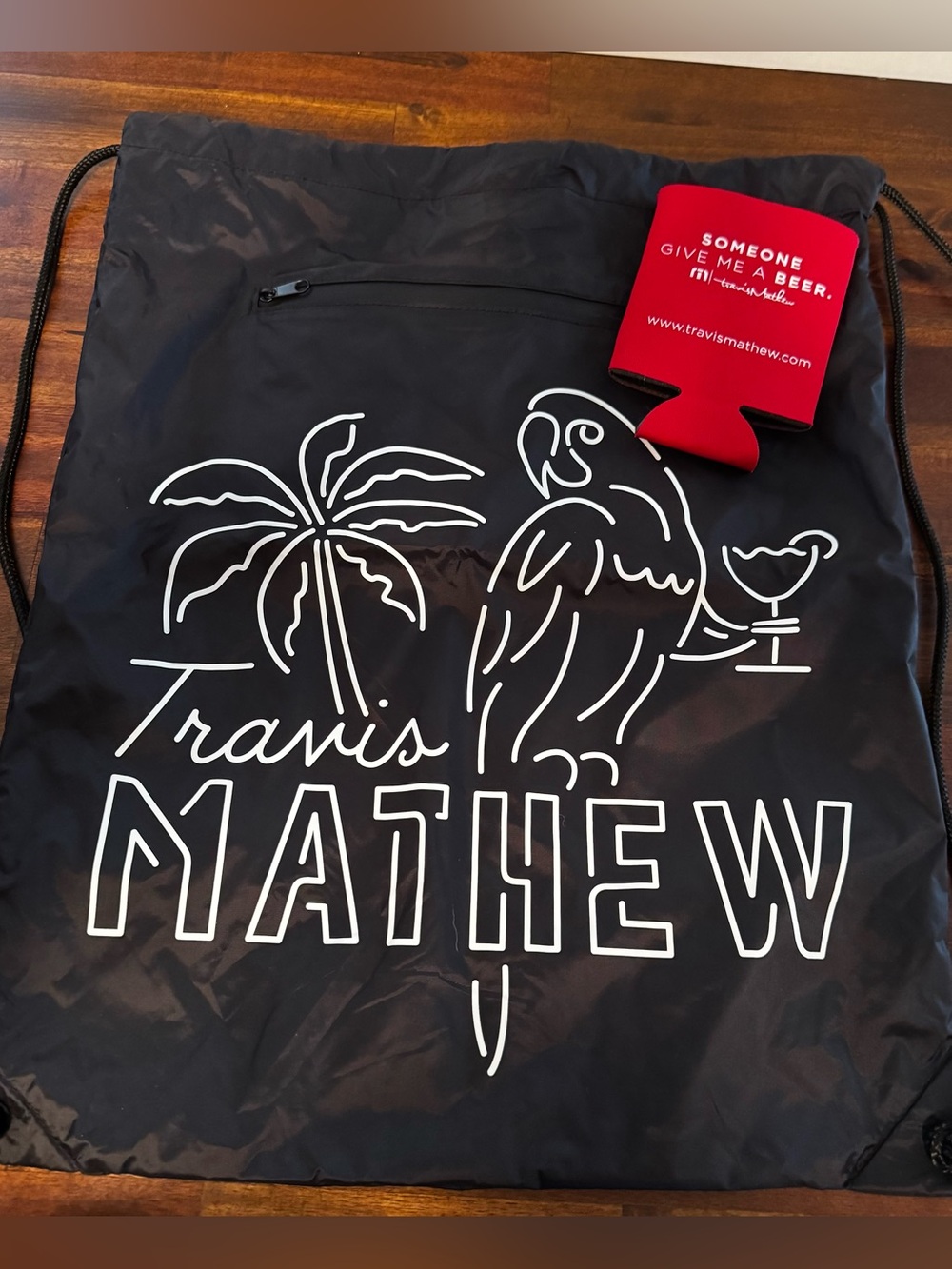 Travis Mathew drawstring bag and coozie